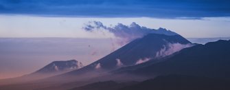 landscape of volcano and clouds